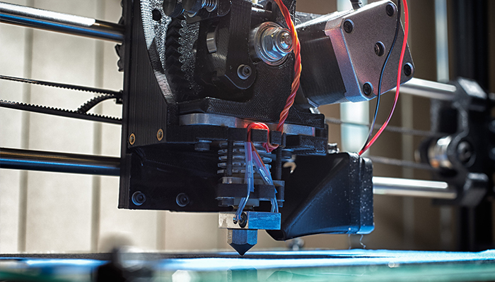Additive Manufacturing Additive manufacturing equipment in use in an advanced manufacturing facility.